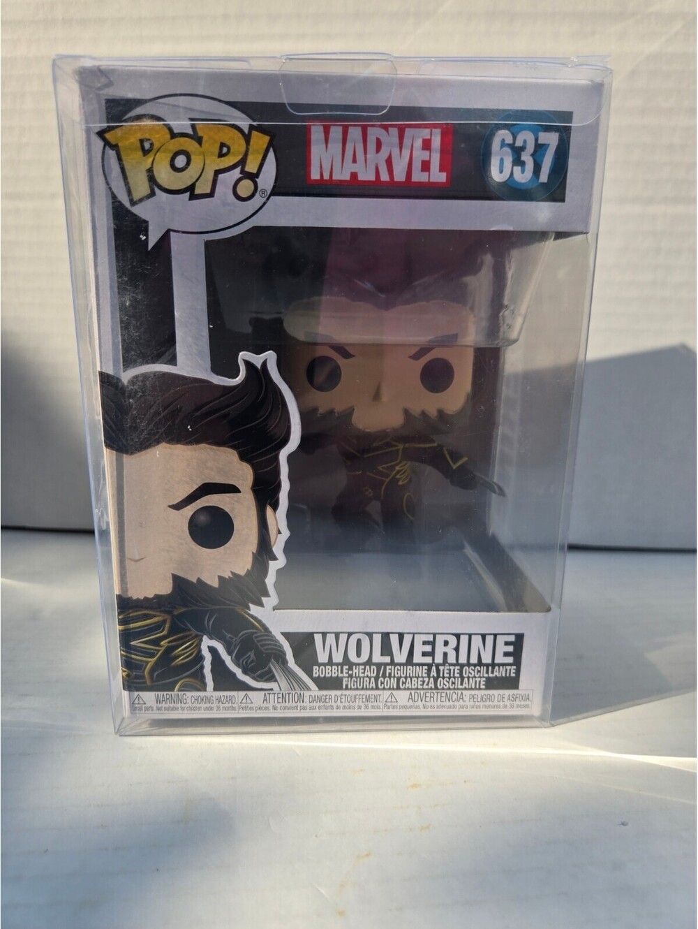 Funko Pop Marvel Wolverine #637 20th anniversary in plastic case